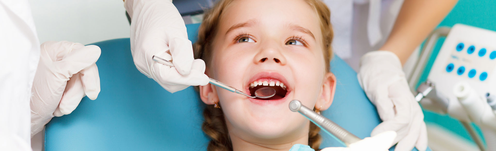 Little girl visiting dentist