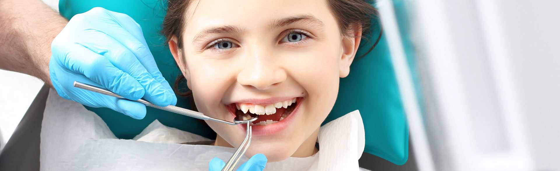 A girl is having interceptive orthodontics treatments