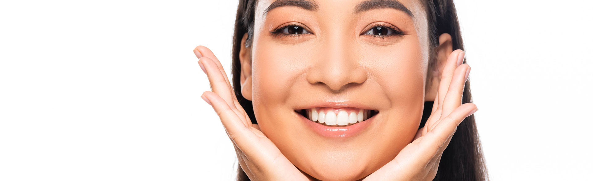 A woman with a radiant smile, symbolizing the benefits of orthodontic treatments.