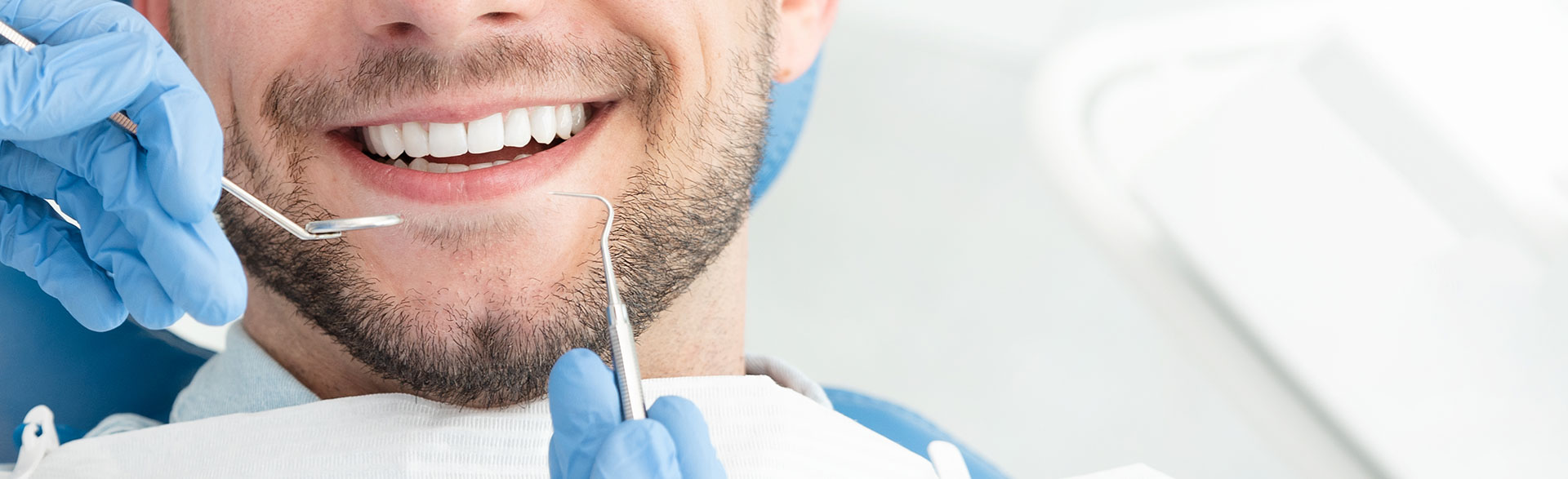 Man smiling at dental