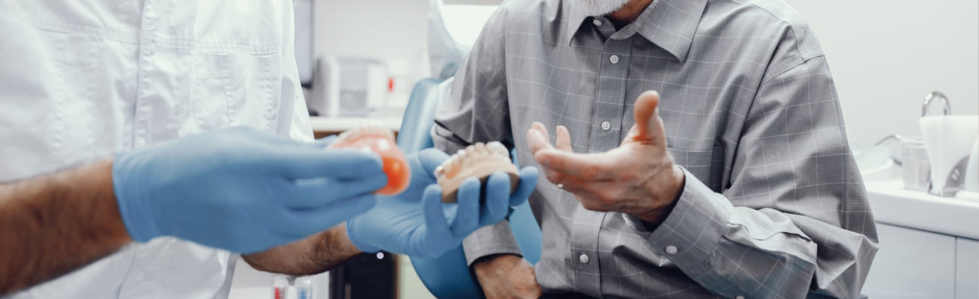 Implant-supported overdentures shown, emphasizing stability and functionality.