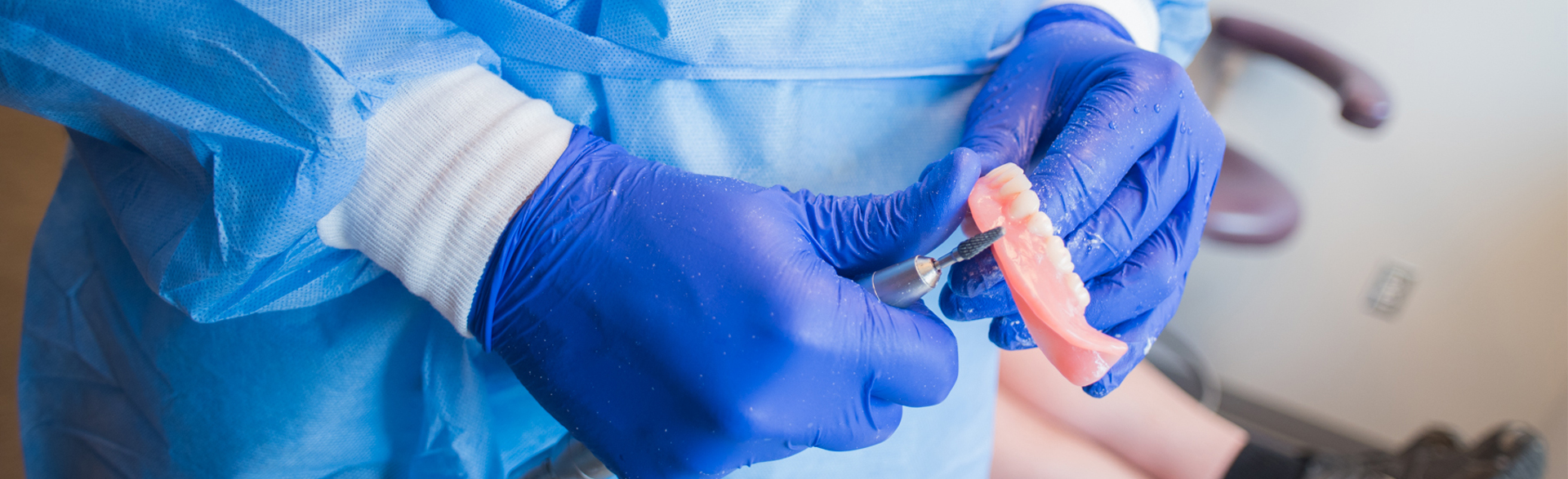 A prosthodontist providing specialized dental restoration services.